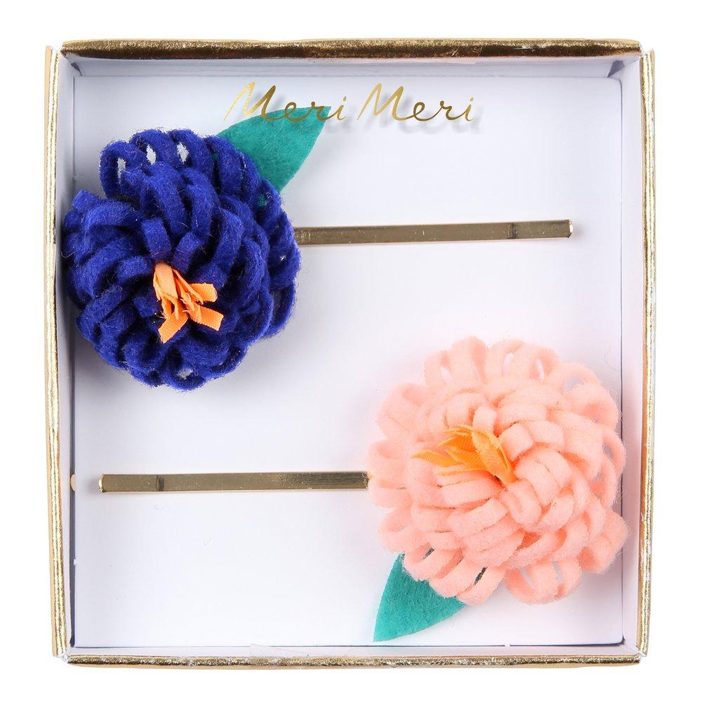 These floral hair slides are beautifully crafted from coloured felt with embroidered details.