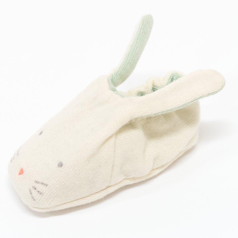 These adorable bunny booties are crafted from knitted organic cotton, with a mint lining, stitched features and floppy ears.