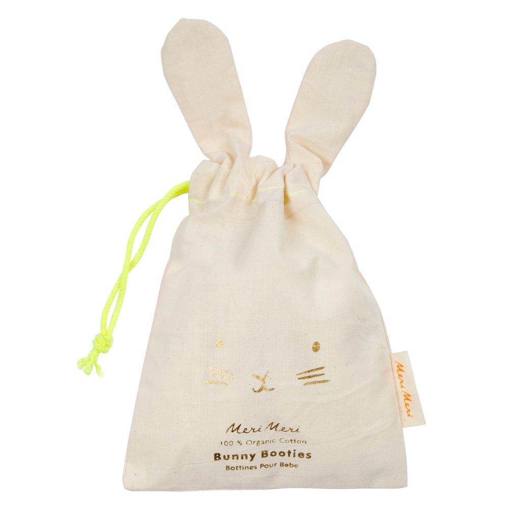 These adorable bunny booties are crafted from knitted organic cotton, with a mint lining, stitched features and floppy ears.