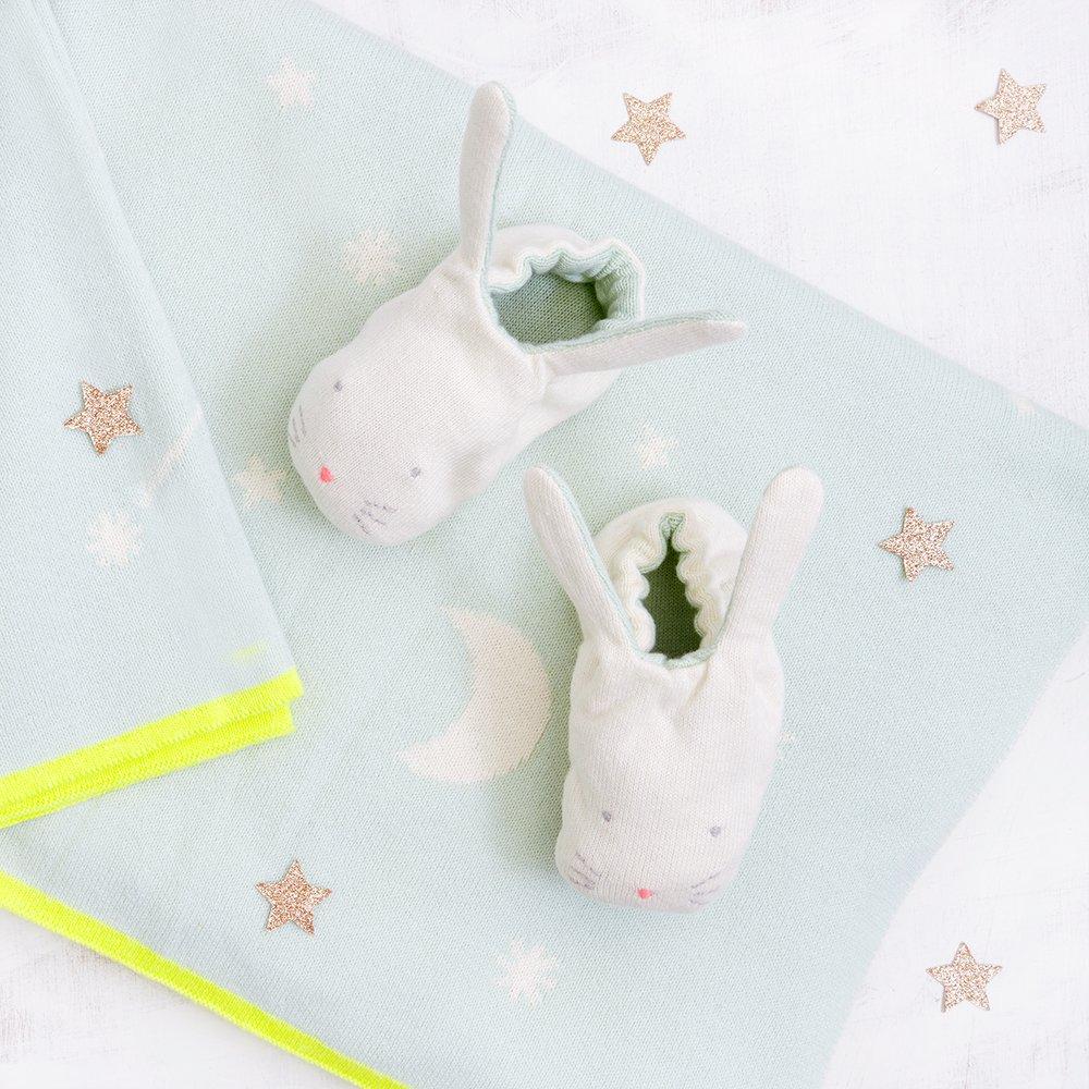 These adorable bunny booties are crafted from knitted organic cotton, with a mint lining, stitched features and floppy ears.