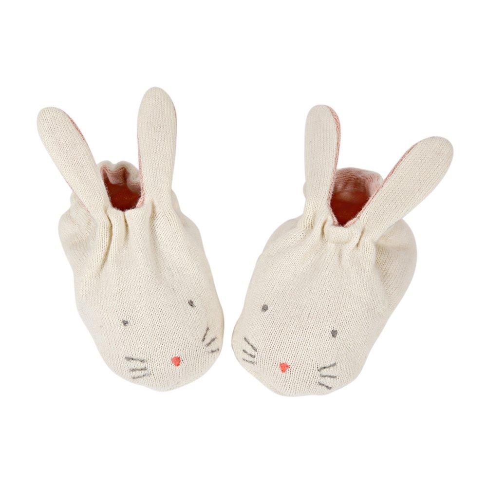 These adorable bunny booties are crafted from knitted organic cotton, with a peach lining, stitched features and floppy ears.