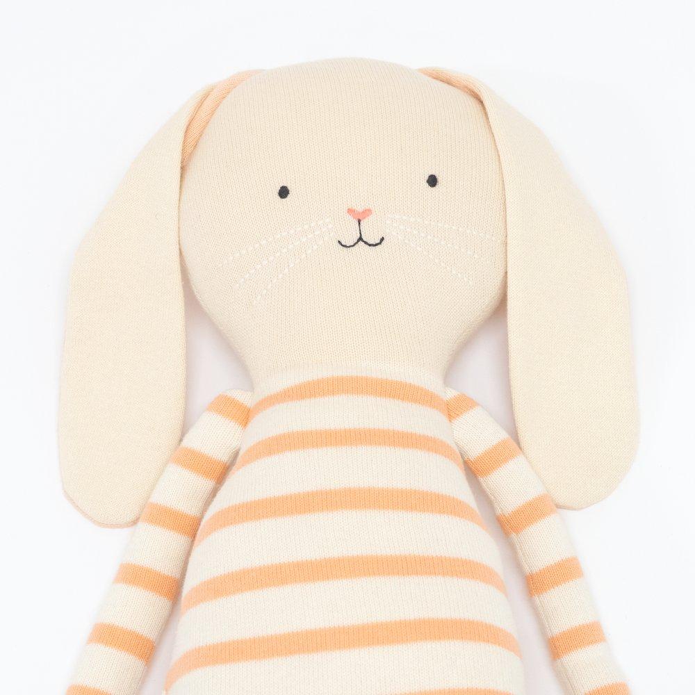 Alfalfa bunny is crafoted from knitted organic cotton, with floppy ears, a pompom tail and sweet stitched features. 