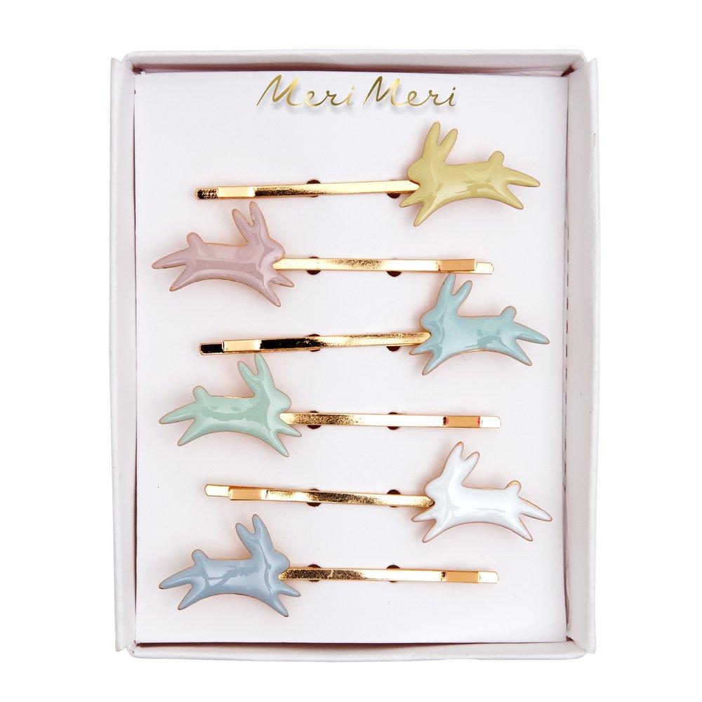 These bunny hair slides are beautifully crafted from pastel enamel on gilt brass, with gold tone slides.