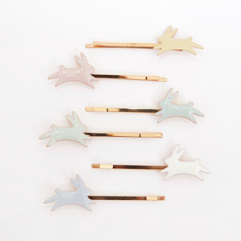 These bunny hair slides are beautifully crafted from pastel enamel on gilt brass, with gold tone slides.