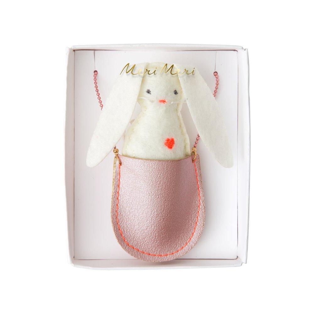 This pretty necklace features a padded felt bunny, sitting in a glittery pink leatherette pocket, with a pink bead chain. 