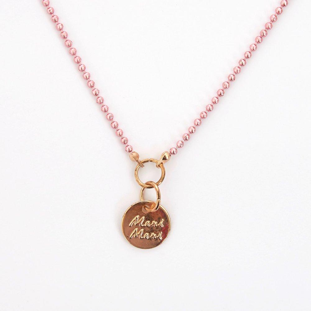 This pretty necklace features a padded felt bunny, sitting in a glittery pink leatherette pocket, with a pink bead chain. 