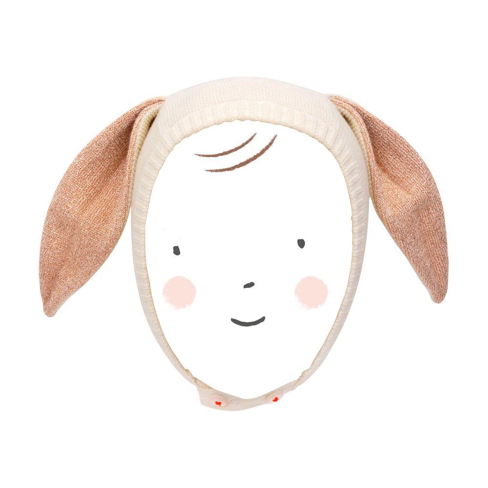 This organic cotton bunny bonnet has a shimmering peach inner on the ears, and an ivory coloured button fastening. 