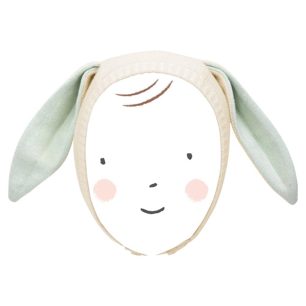 This delightful bunny baby bonnet is crafted from knitted organic cotton, with mint detail on the ears, and fastens with ivory coloured buttons. 