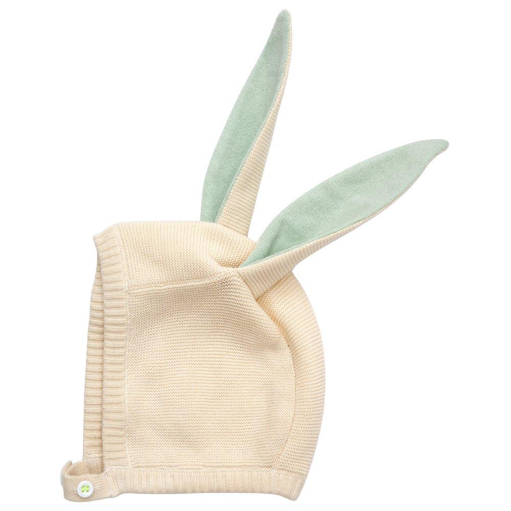 This delightful bunny baby bonnet is crafted from knitted organic cotton, with mint detail on the ears, and fastens with ivory coloured buttons. 