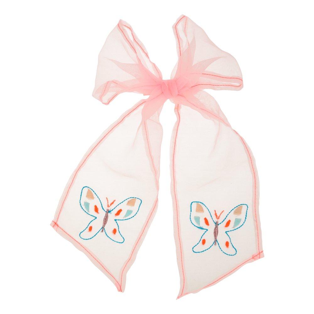 This pretty clip features a  pink net fabric bow which has beautiful butterflies embroidered on it. 