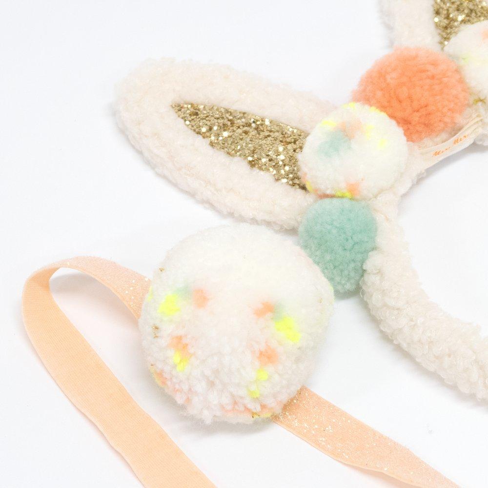 This wonderful bunny set includes a headband with ears and pompoms, and a pompom tail.