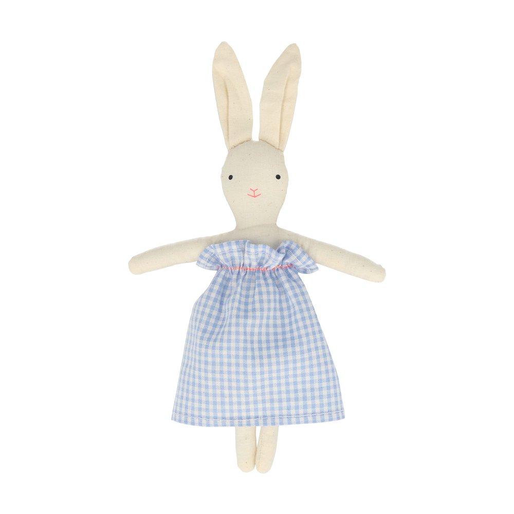 The bunny case opens to reveal an adorable mini bunny doll, with a striped tote bag and felt carrots. 