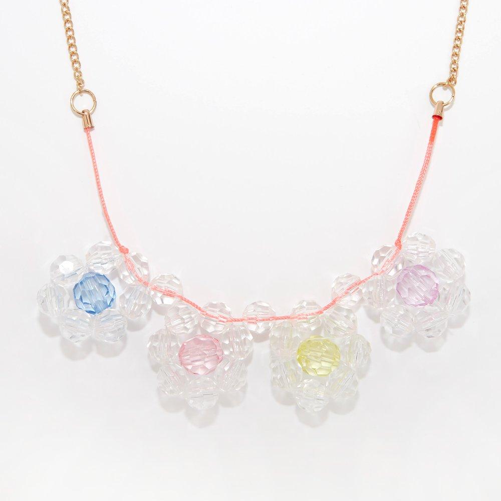 This pretty necklace is crafted with 4 bead flower pennants, and a neon cord with a gold tone chain fastener.