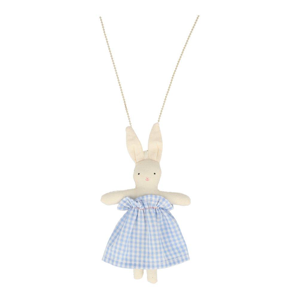 This beautiful necklace features a cotton bunny doll, dressed in an adorable blue gingham dress, on a gold enamel bead chain. 