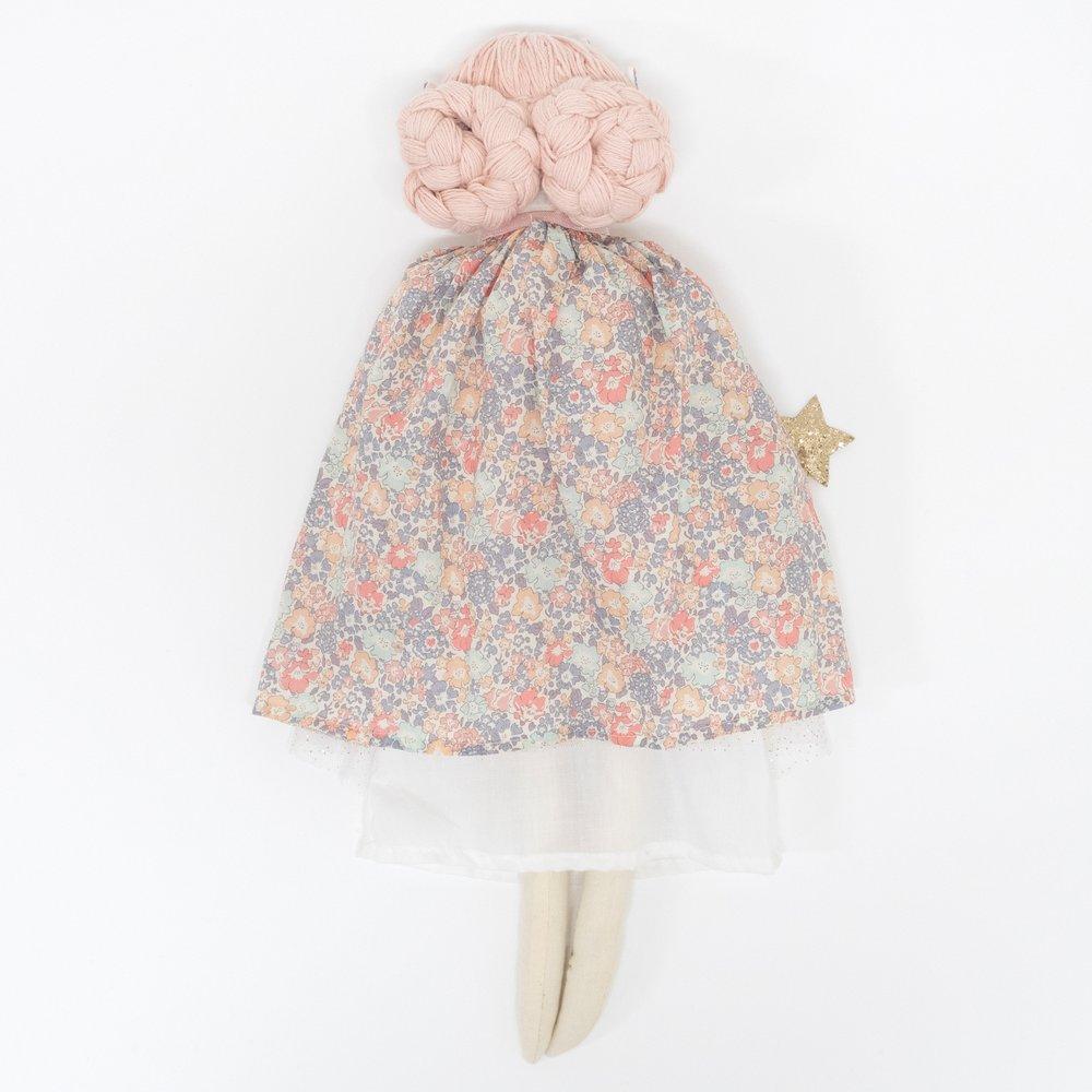 This beautiful princess doll has a white tulle dress with a Liberty floral cape, a crown and a star wand.