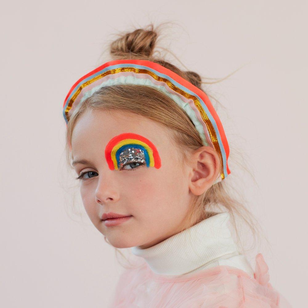 This beautiful fabric headband, with colourful ribbon ruffles, makes a wonderful hair accessory. 