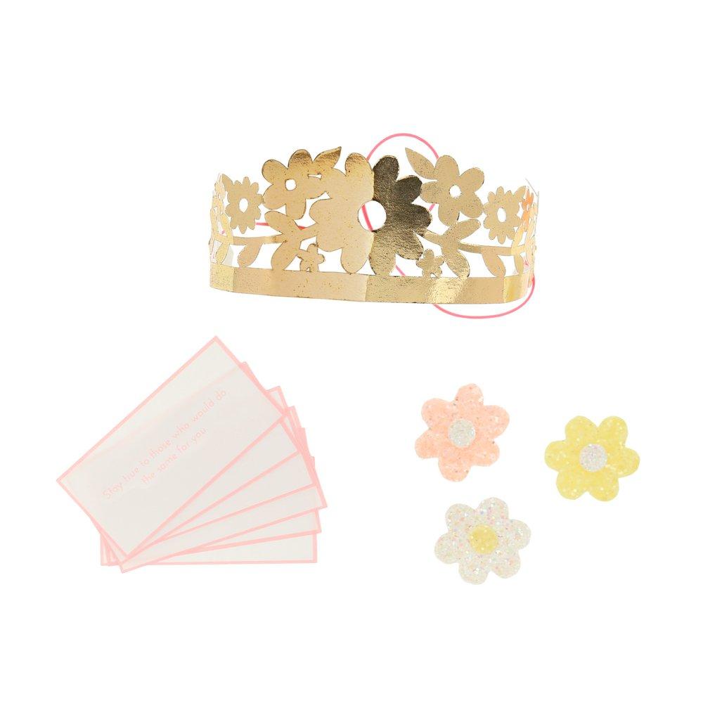 These pretty pink crackers are decorated with tissue paper flowers, and contain a tiara and sparkling glitter brooch.