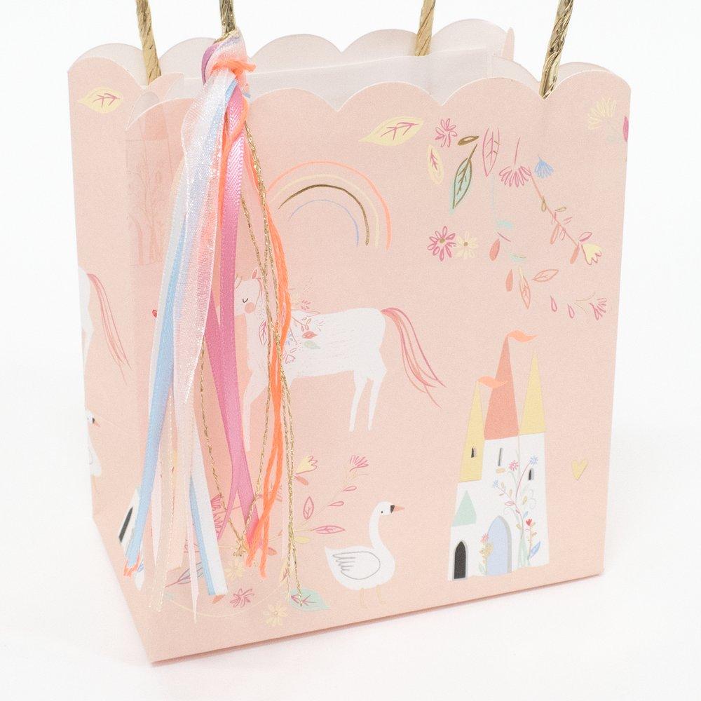 These beautiful party bags feature unicorns, swans and castles, with a scalloped edge and gold foil detail.