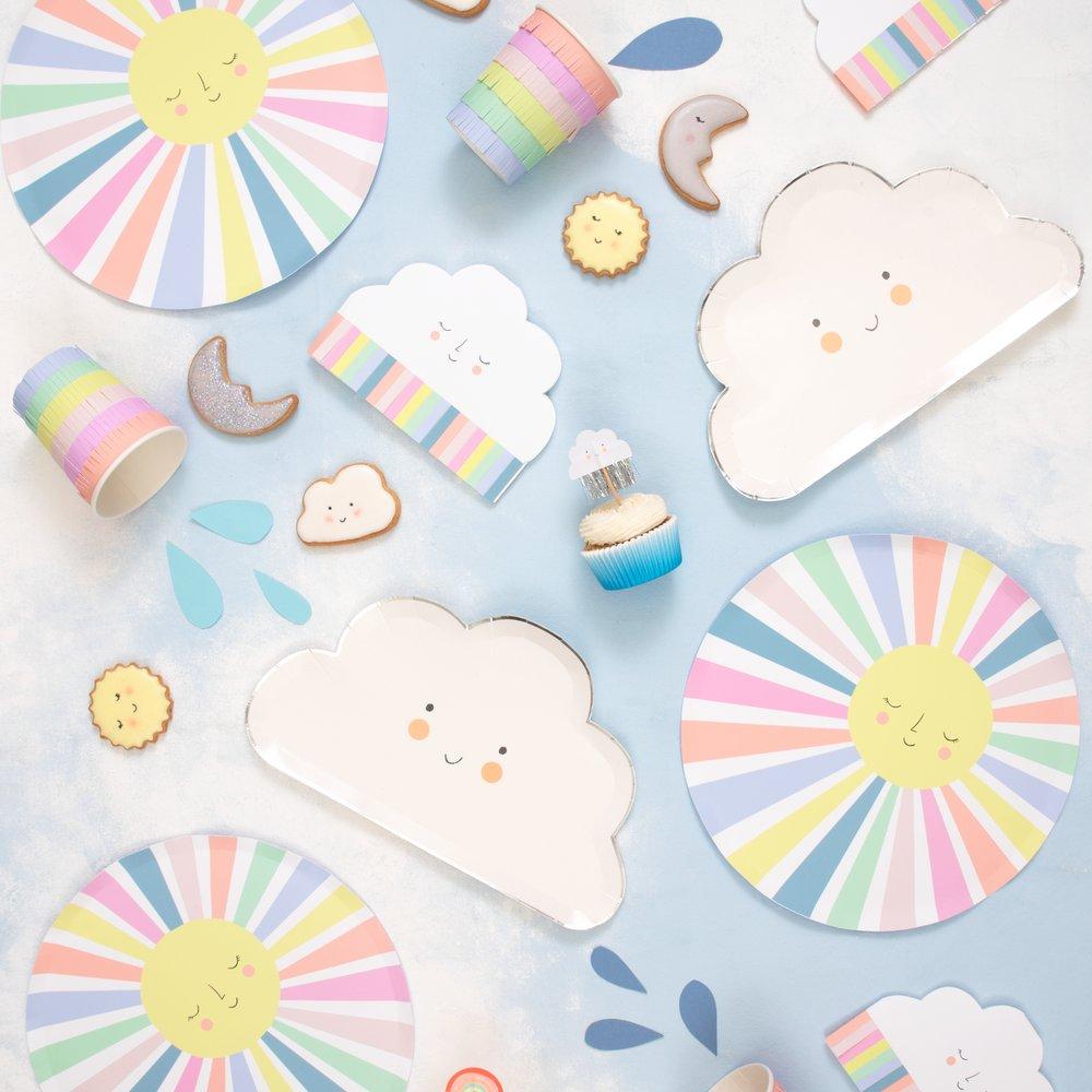 These party napkins feature a smiling cloud with bright tissue paper fringed details. 